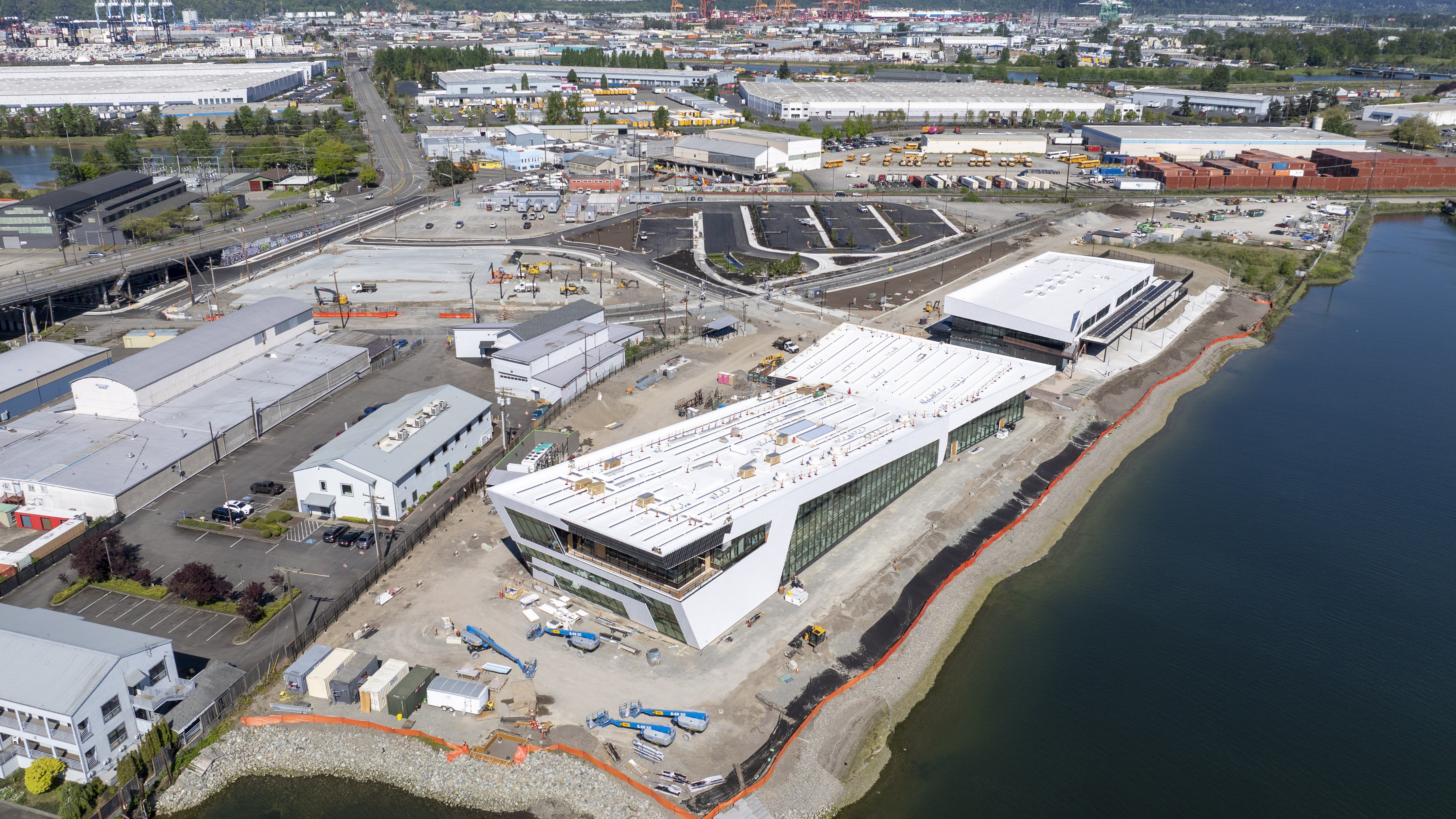 Aerial view of the Maritime Center construction site along the Foss Waterway.