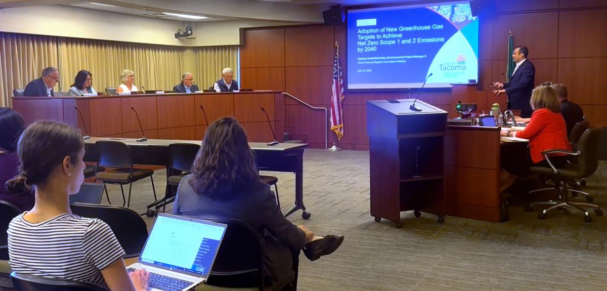 Graham VanderSchelden, Environmental Project Manager presents to the Port commission.